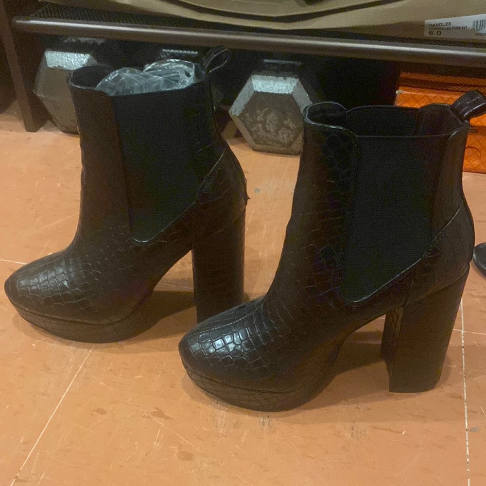 Snake skin leather bootie heels. Worn once!